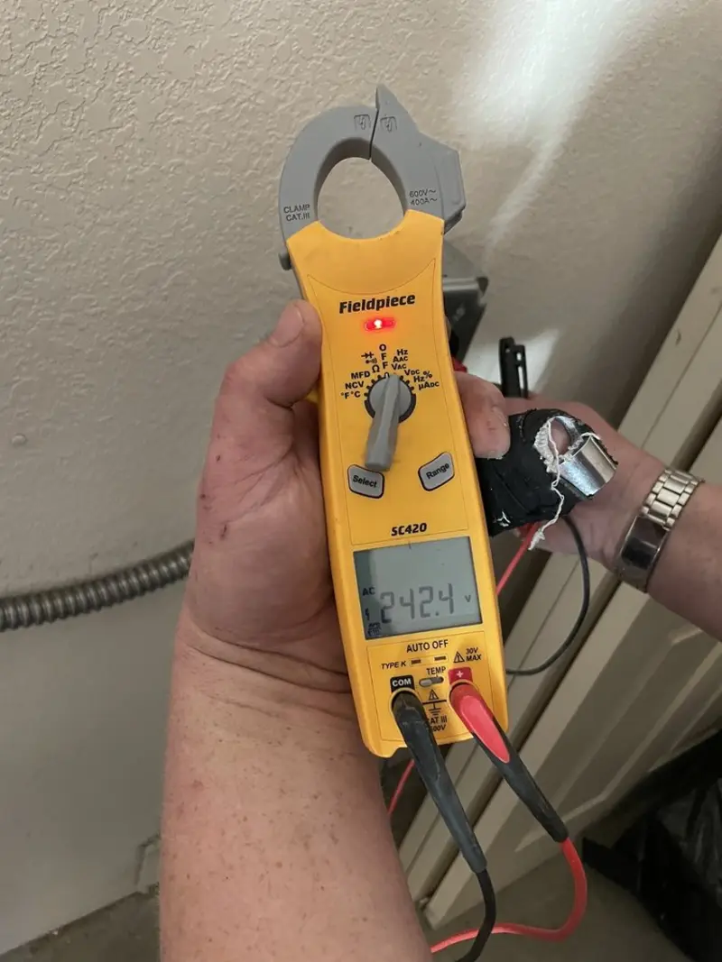 Voltage testing with clamp meter during Generator Installation in Arroyo Grande